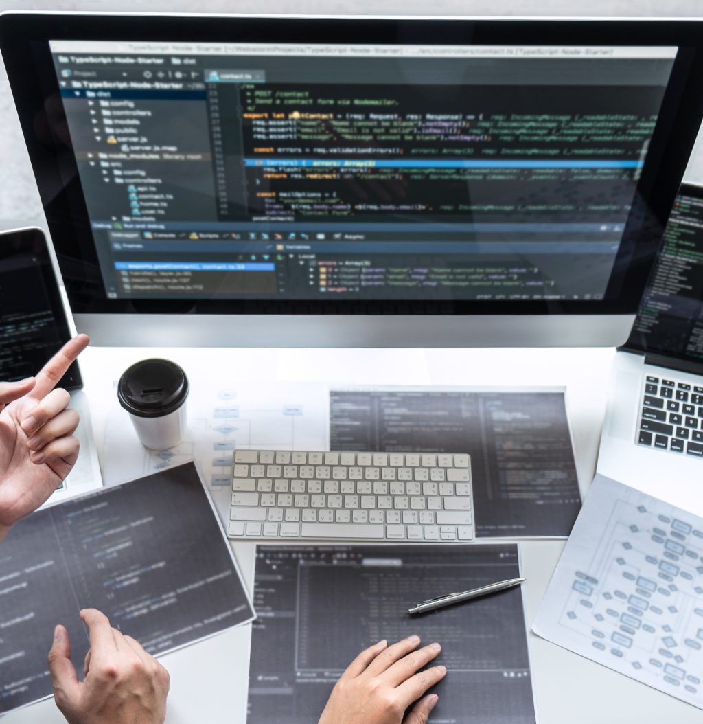 Team of developer programmer working on project in software development computer in IT company office, Writing codes and data code website and coding database technologies to find problem solution.